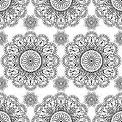 Seamless pattern with black mehndi floral henna lace buta decoration items in Indian style.