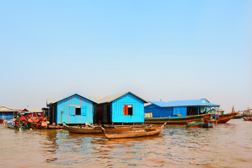 Fototapeta premium Houseboats in floating village, Tonle Sap lake, Cambodia