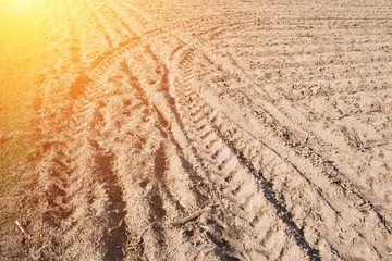 Tire mark on arable land