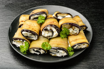 Appetizer - eggplant rolls stuffed with creme cheese, garlic and greens. 