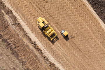 Obraz premium Aerial view of the working earth mover