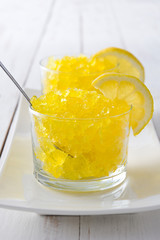 Lemon slushie on white wood
