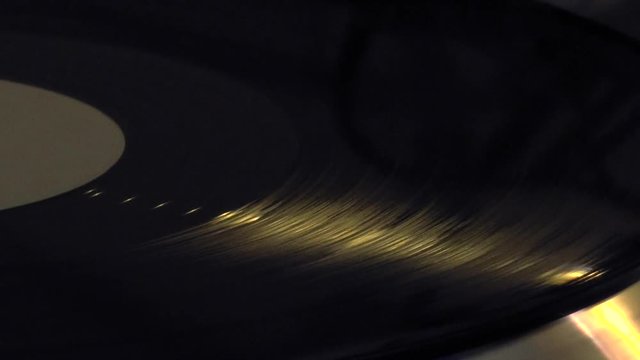 Vinyl Turntable with White Label Record - Closeup