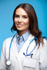 smiling female doctor, on blue