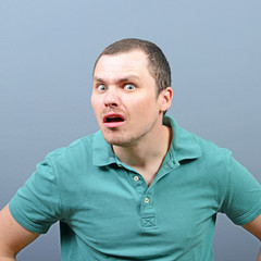 Portrait of man listening on private conversation