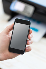 Unrecognizable man using mobile phone