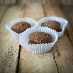 Chocolate cookies on wooden table