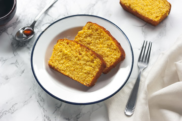 Slices of sponge cake and caramel