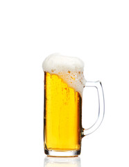 Glass of beer isolated on white background
