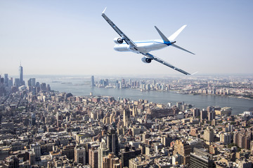 Airplane flying over  New York City