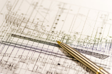 Image of construction business, with construction drawing