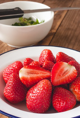 Fresh strawberries on wooden background
