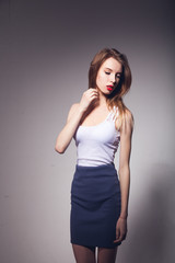 girl beautiful portrait  posing white jersey skirt white  background