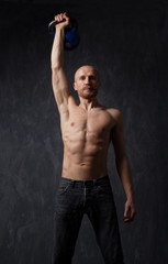 Fototapeta premium Exercise With Kettle Bell.