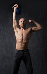 Fototapeta premium Exercise With Kettle Bell.