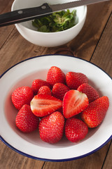 Fresh strawberries on wooden background