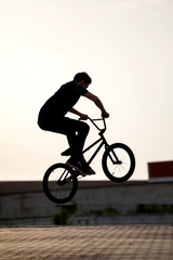 Fototapeta premium teenager on a bicycle