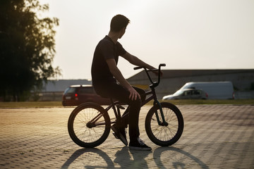 Fototapeta na wymiar teenager on a bicycle