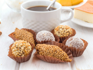 cup of coffee with chocolates