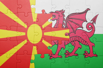 puzzle with the national flag of wales and macedonia