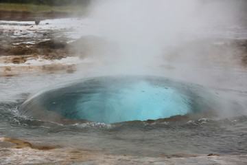 Erupting Strokkur Geyser. Iceland