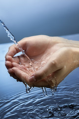 Fototapeta premium Water in hand