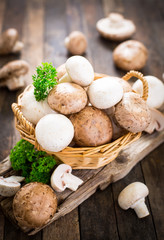 Champignon mushroom on the wooden table
