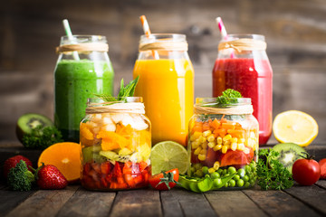 Healthy fruit and vegetable salad and smoothies in the jar