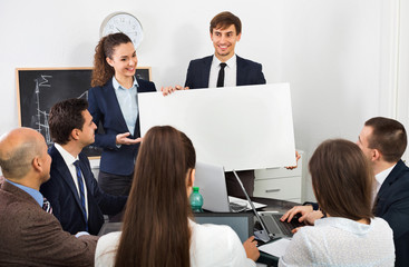 Fototapeta premium Positive colleagues discussing new development plan