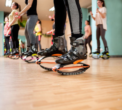 group of woman doing exercises  fitness with  kangoo shoes