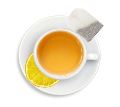 white cup with tea, lemon and tea bag isolated on white