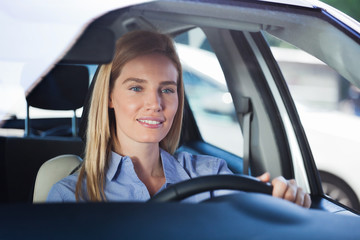 Naklejka premium Woman in car