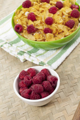 cornflakes with milk and raspberries