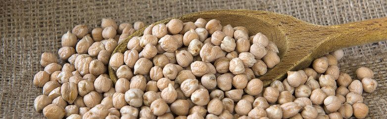 chickpeas on sackcloth with spoon