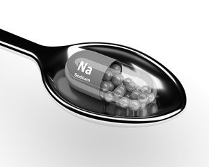 3d sodium pill on spoon over white