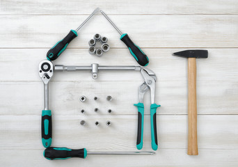 Top view different type of constructive tools making shape home, house.