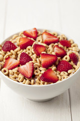  macro cereal bowl with slice strawberries