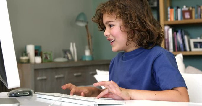  Happy son using computer