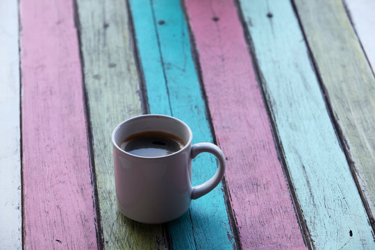 coffee cup on colorful panel