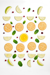 Food pattern of cookies with mint and lime on a white background