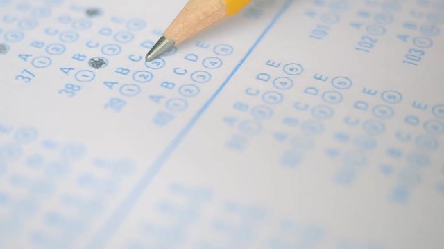 The student testing in exercise, exams answer sheets