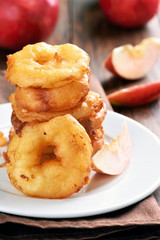 Apple rings on white plate