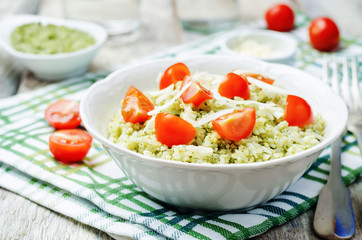 Pesto rice with tomatoes and cheese