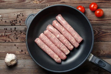 Raw Sausages in a Pan