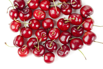 a pile of red cherries