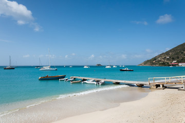 Small boats docked at the pier