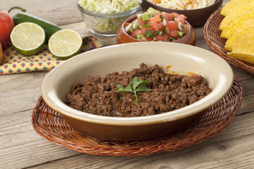 taco ingredients focusing the cooked meat