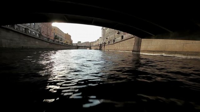 Flight near the water in canal in Saint-Petersburg