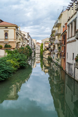 Fototapeta na wymiar Padua architecture along the canal. Padova, Veneto,