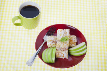 top view of apple pie with black coffee.